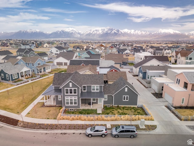 bird's eye view featuring a residential view and a mountain view