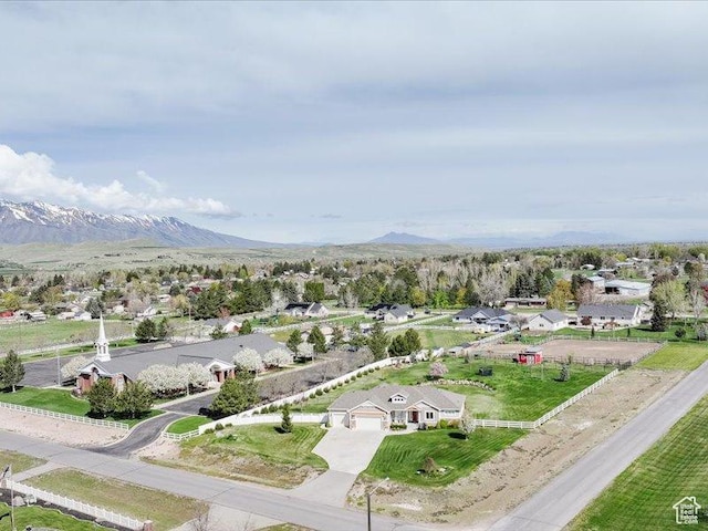 birds eye view of property featuring a residential view and a mountain view