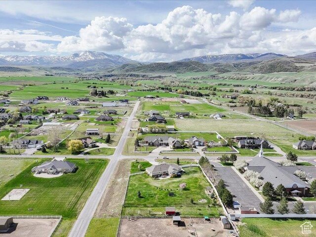 drone / aerial view featuring a mountain view