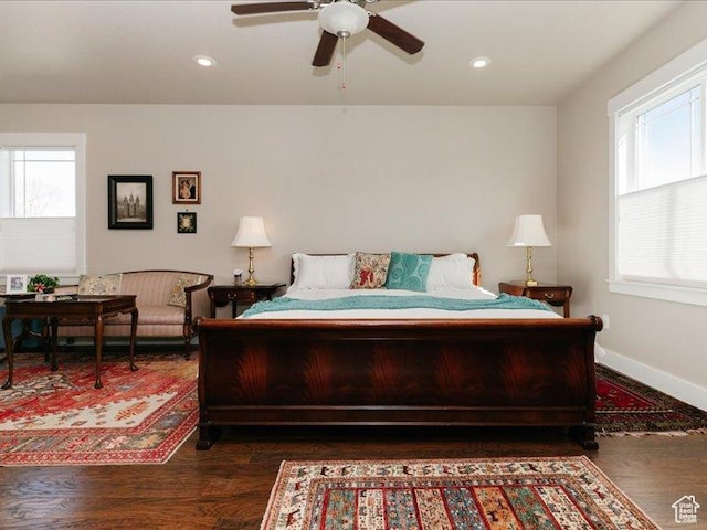 bedroom with baseboards, recessed lighting, a ceiling fan, and wood finished floors