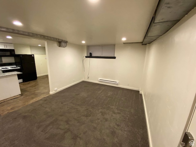 953 E 24th St, Ogden, UT 84401 - finished basement featuring a baseboard heating unit, dark carpet, freestanding refrigerator, and recessed lighting