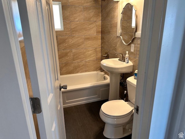 953 E 24th St, Ogden, UT 84401 - full bathroom featuring shower / bath combination, toilet, and tile walls