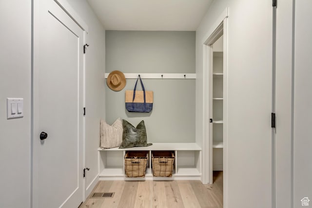mudroom featuring visible vents and wood finished floors
