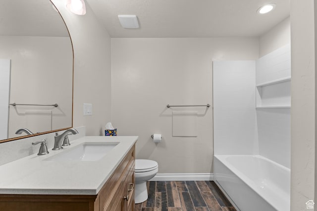 294 W Farmside Dr S, Saratoga Springs, UT 84045 - bathroom featuring wood finished floors, baseboards, toilet, and vanity
