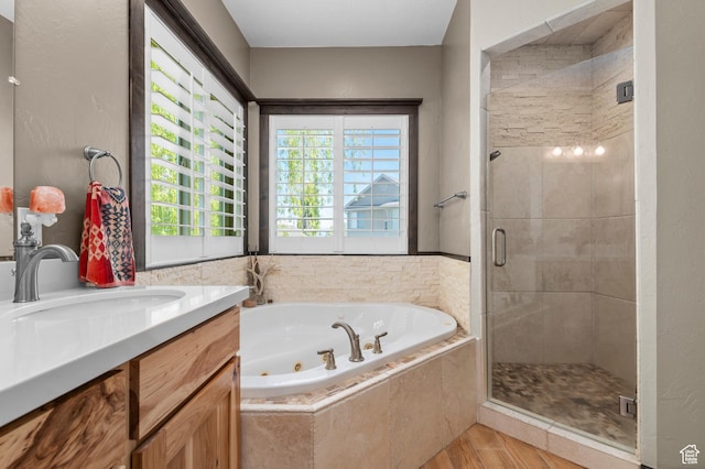 294 W Farmside Dr S, Saratoga Springs, UT 84045 - full bathroom with a stall shower, a tub with jets, vanity, and wood finished floors