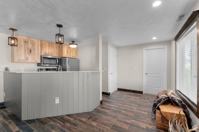 294 W Farmside Dr S, Saratoga Springs, UT 84045 - kitchen featuring appliances with stainless steel finishes, light brown cabinets, dark wood-style flooring, a peninsula, and recessed lighting