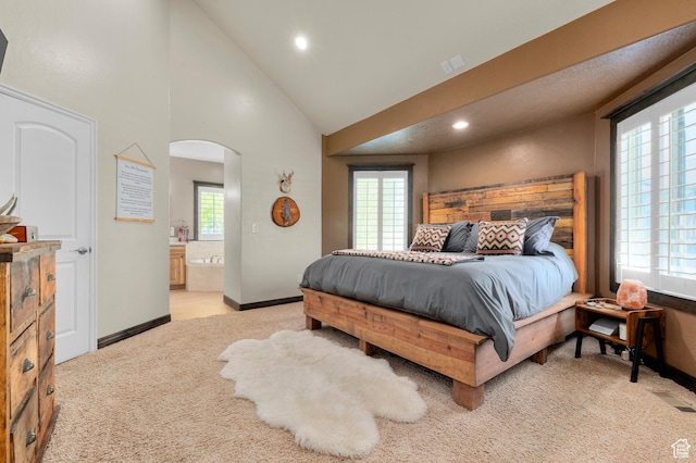 294 W Farmside Dr S, Saratoga Springs, UT 84045 - bedroom with light colored carpet, arched walkways, recessed lighting, baseboards, and connected bathroom