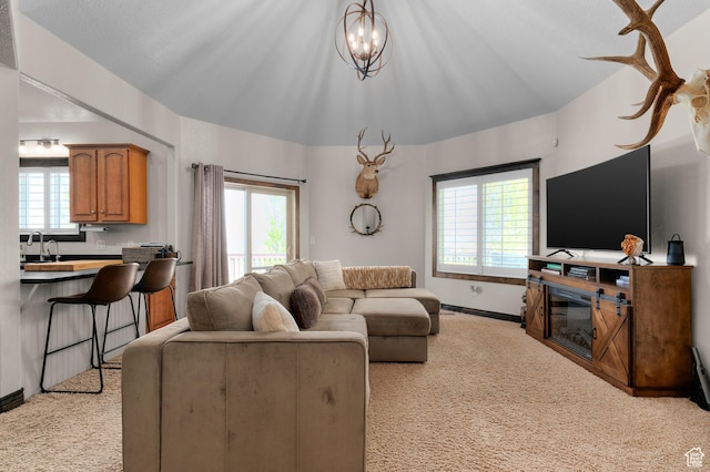 294 W Farmside Dr S, Saratoga Springs, UT 84045 - living area featuring light colored carpet, baseboards, and a chandelier