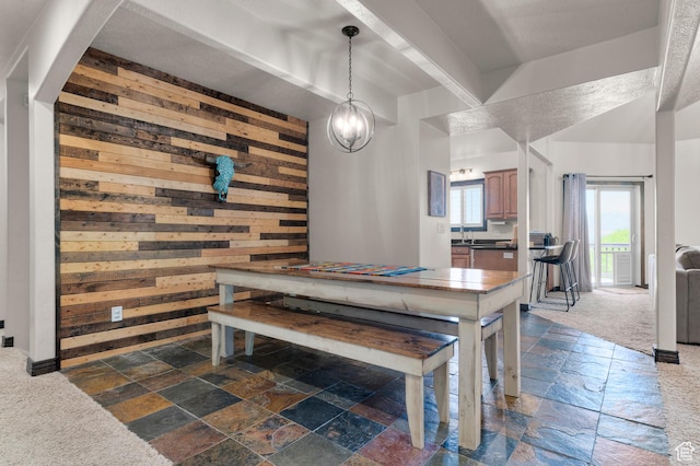294 W Farmside Dr S, Saratoga Springs, UT 84045 - dining space with stone tile flooring and wooden walls