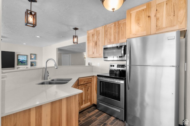 294 W Farmside Dr S, Saratoga Springs, UT 84045 - kitchen with appliances with stainless steel finishes, a sink, dark wood-type flooring, light countertops, and light brown cabinetry