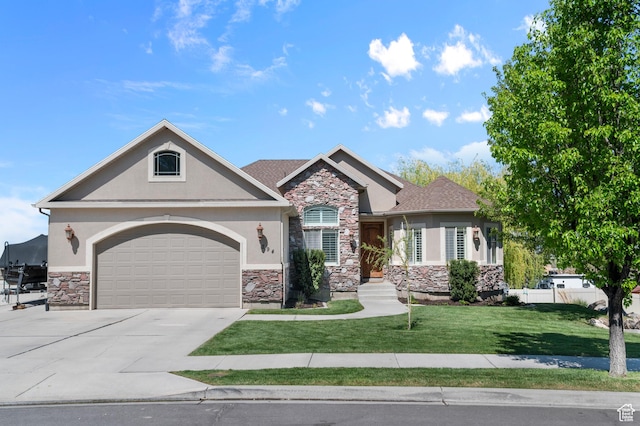 craftsman house featuring driveway, a front yard, a garage, stone siding, and stucco siding