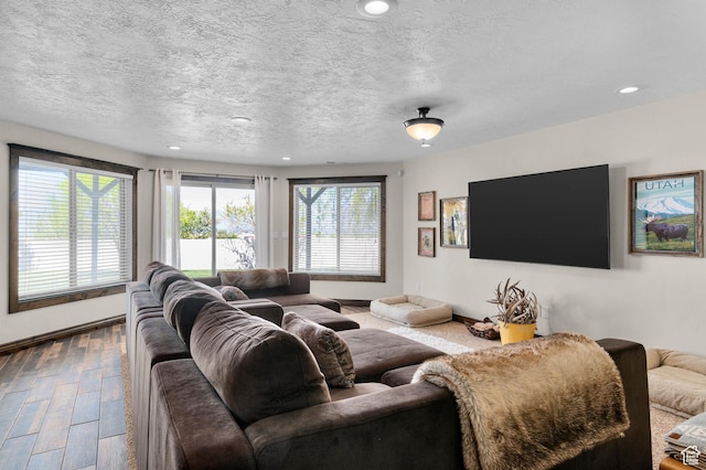 294 W Farmside Dr S, Saratoga Springs, UT 84045 - living room featuring recessed lighting, dark wood-type flooring, a textured ceiling, and baseboards