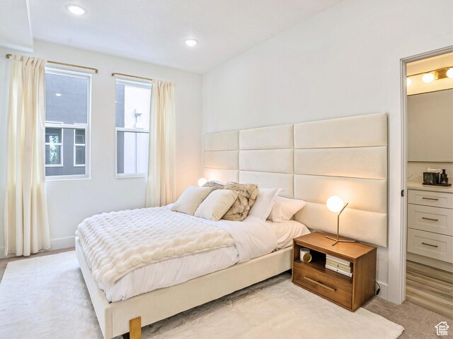 bedroom with recessed lighting