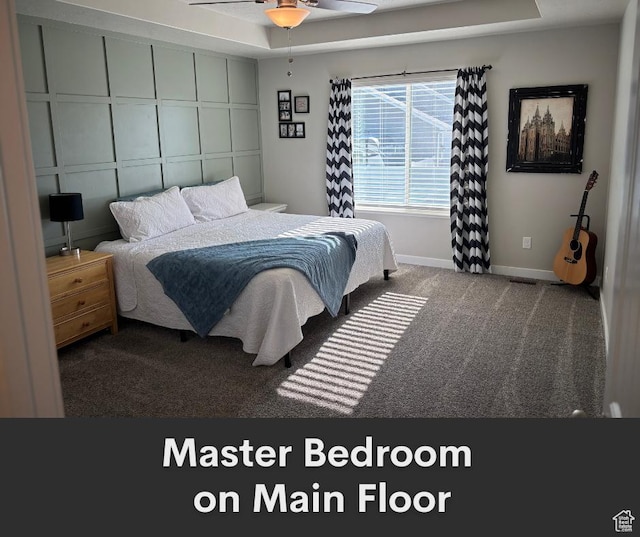2447 N 2950 W, Plain City, UT 84404 - carpeted bedroom featuring baseboards, ceiling fan, and a tray ceiling