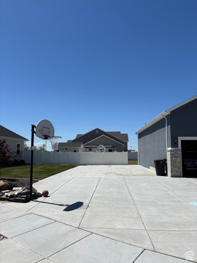2447 N 2950 W, Plain City, UT 84404 - view of patio featuring basketball hoop