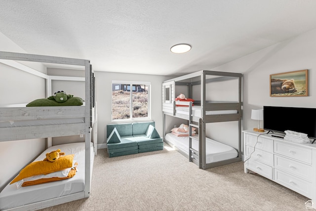 3467 S Porcupine Cir, Garden City, UT 84028 - bedroom featuring light carpet and a textured ceiling