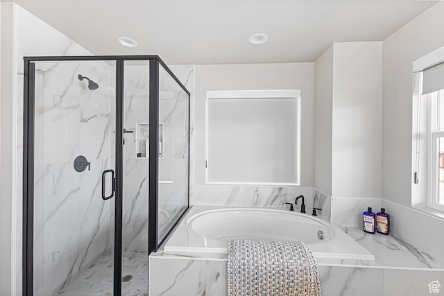 3467 S Porcupine Cir, Garden City, UT 84028 - full bathroom featuring recessed lighting, a marble finish shower, a wealth of natural light, and a garden tub