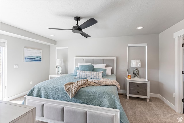 3467 S Porcupine Cir, Garden City, UT 84028 - carpeted bedroom with baseboards, a ceiling fan, recessed lighting, and a textured ceiling