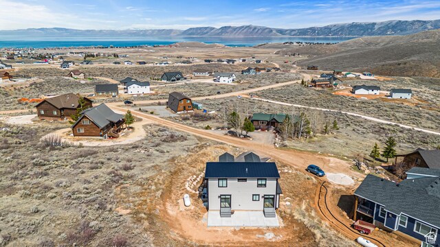 3467 S Porcupine Cir, Garden City, UT 84028 - drone / aerial view with a water and mountain view