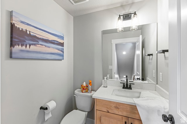 3467 S Porcupine Cir, Garden City, UT 84028 - half bathroom featuring vanity, toilet, and visible vents