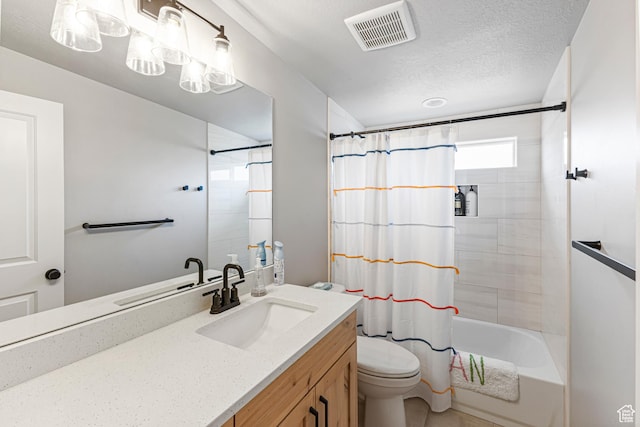 3467 S Porcupine Cir, Garden City, UT 84028 - full bathroom with visible vents, vanity, toilet, shower / bathtub combination with curtain, and a textured ceiling