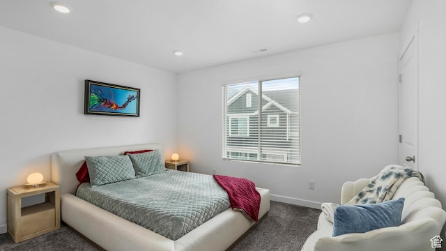 carpeted bedroom featuring recessed lighting, baseboards, and visible vents