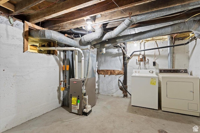 555 15th St, Ogden, UT 84404 - unfinished below grade area with heating unit and washer and clothes dryer