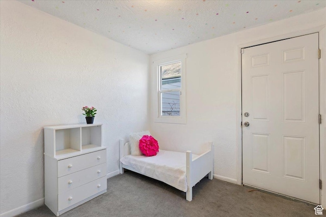 555 15th St, Ogden, UT 84404 - bedroom featuring carpet floors, baseboards, and a textured wall