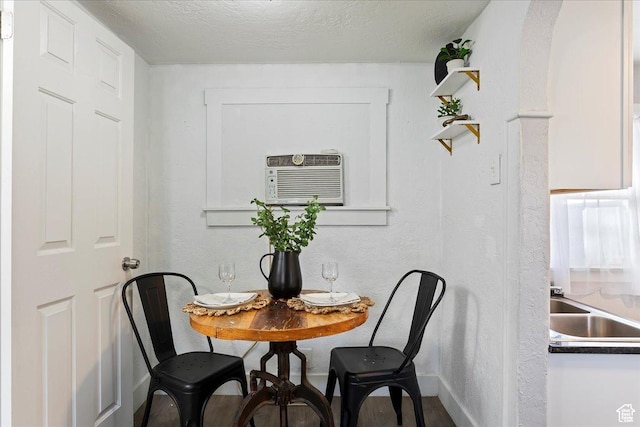 555 15th St, Ogden, UT 84404 - dining area with a textured ceiling and baseboards