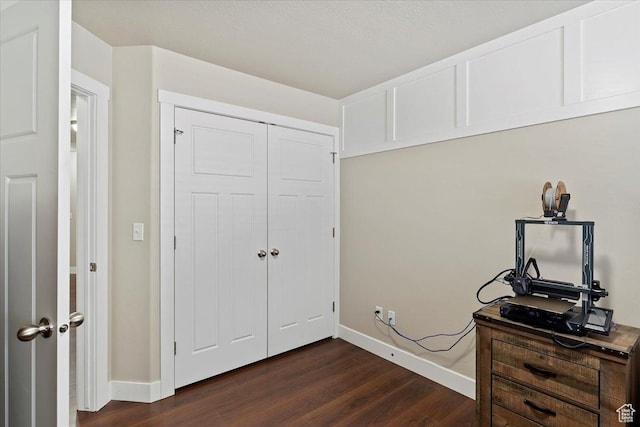 1545 N 420 W Unit 103, Logan, UT 84341 - interior space with baseboards, a closet, and dark wood-style floors