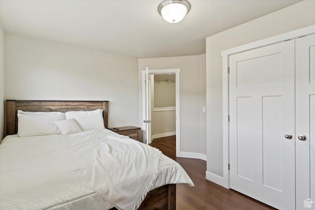 1545 N 420 W Unit 103, Logan, UT 84341 - bedroom featuring a closet, baseboards, and wood finished floors