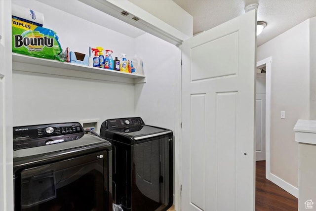 1545 N 420 W Unit 103, Logan, UT 84341 - laundry area with laundry area, washer and clothes dryer, baseboards, and wood finished floors