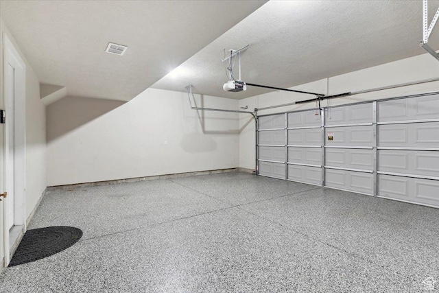 1545 N 420 W Unit 103, Logan, UT 84341 - garage with a garage door opener and baseboards