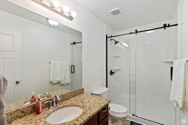1545 N 420 W Unit 103, Logan, UT 84341 - full bathroom featuring visible vents, vanity, toilet, and a shower stall