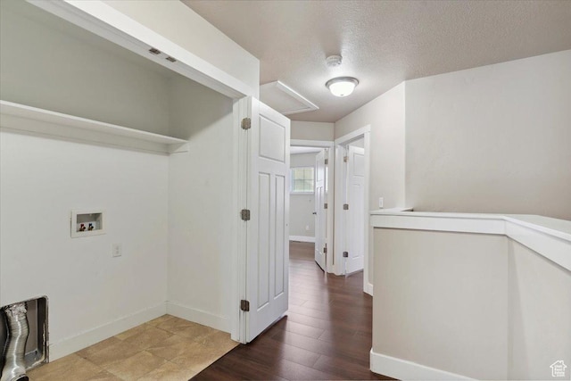 1545 N 420 W Unit 103, Logan, UT 84341 - laundry area featuring hookup for a washing machine, a textured ceiling, baseboards, and attic access