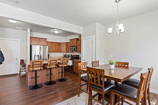 1545 N 420 W Unit 103, Logan, UT 84341 - dining area with visible vents, dark wood-style flooring, and a chandelier