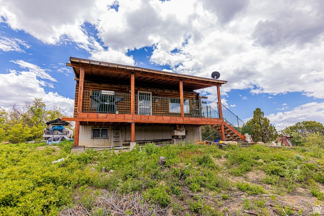 2185 Crestridge Rd Unit 51, Salina, UT 84654 - back of property featuring a wooden deck, log exterior, and stairway