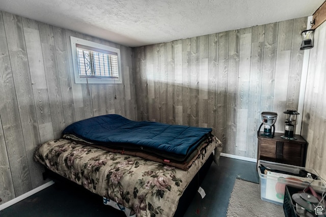 2185 Crestridge Rd Unit 51, Salina, UT 84654 - bedroom with wooden walls and a textured ceiling