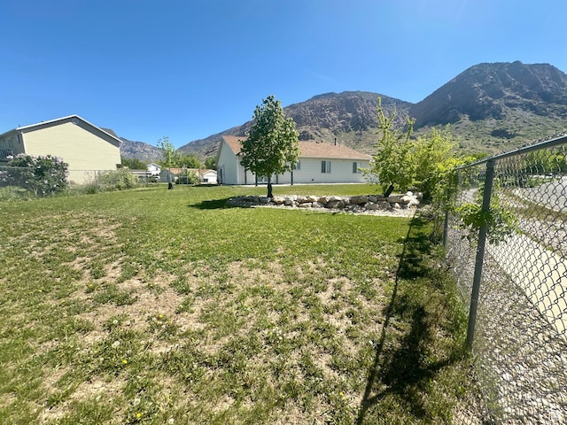 819 E 725 N, Ogden, UT 84404 - view of yard featuring fence and a mountain view