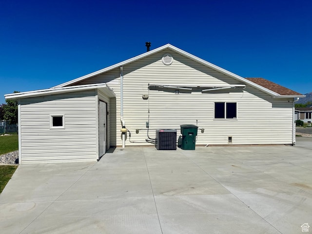 819 E 725 N, Ogden, UT 84404 - back of house featuring a patio area and central AC