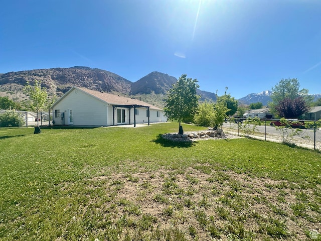 819 E 725 N, Ogden, UT 84404 - view of yard featuring fence and a mountain view