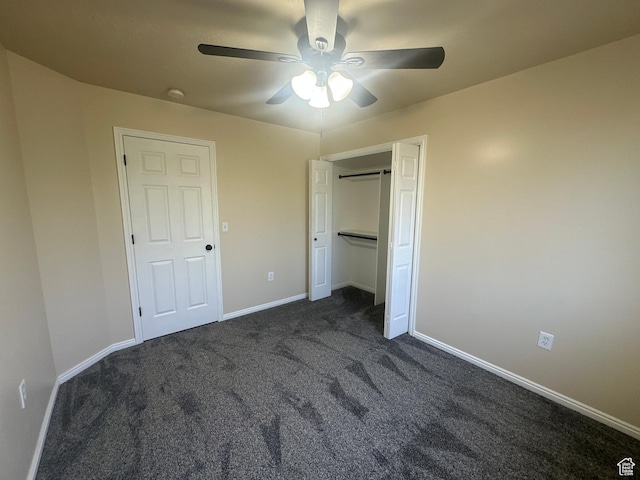 819 E 725 N, Ogden, UT 84404 - unfurnished bedroom featuring a closet, baseboards, ceiling fan, and dark colored carpet