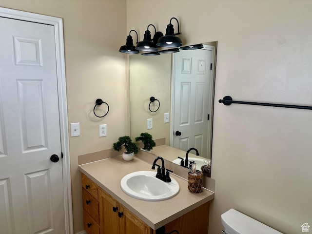 819 E 725 N, Ogden, UT 84404 - bathroom featuring vanity and toilet