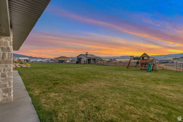 6433 N Glenmar Way, Eagle Mountain, UT 84005 - view of yard featuring a playground and fence