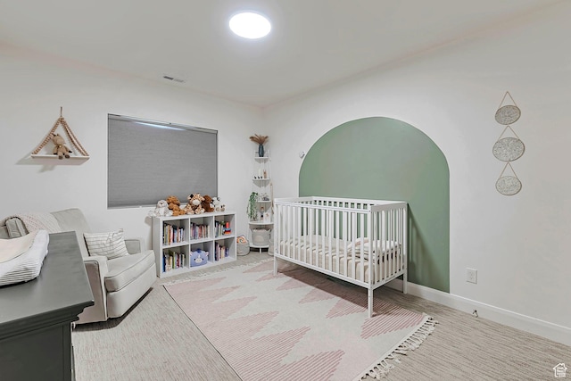 6433 N Glenmar Way, Eagle Mountain, UT 84005 - bedroom with a nursery area, baseboards, and visible vents