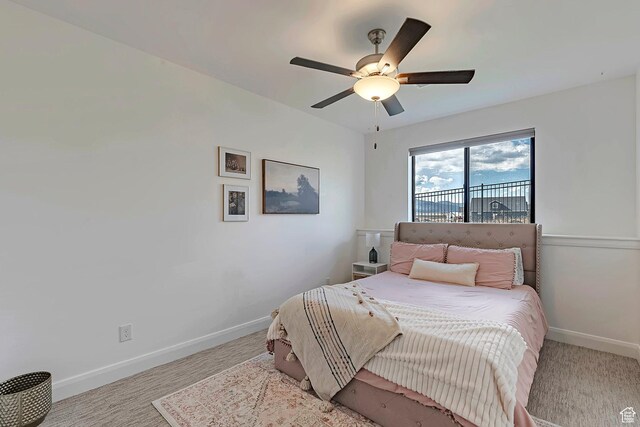 6433 N Glenmar Way, Eagle Mountain, UT 84005 - carpeted bedroom featuring baseboards and ceiling fan