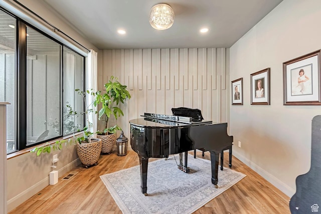6433 N Glenmar Way, Eagle Mountain, UT 84005 - sitting room with baseboards, recessed lighting, wood finished floors, and visible vents