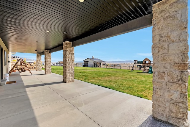 6433 N Glenmar Way, Eagle Mountain, UT 84005 - view of patio / terrace featuring a playground and fence