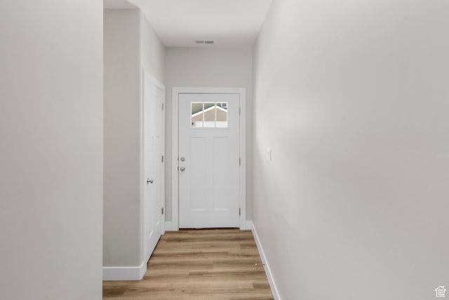 3154 W 1650 N Unit D, Cedar City, UT 84721 - doorway with visible vents, baseboards, and light wood-type flooring