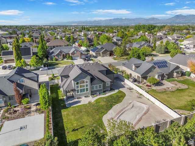 birds eye view of property featuring a residential view and a mountain view